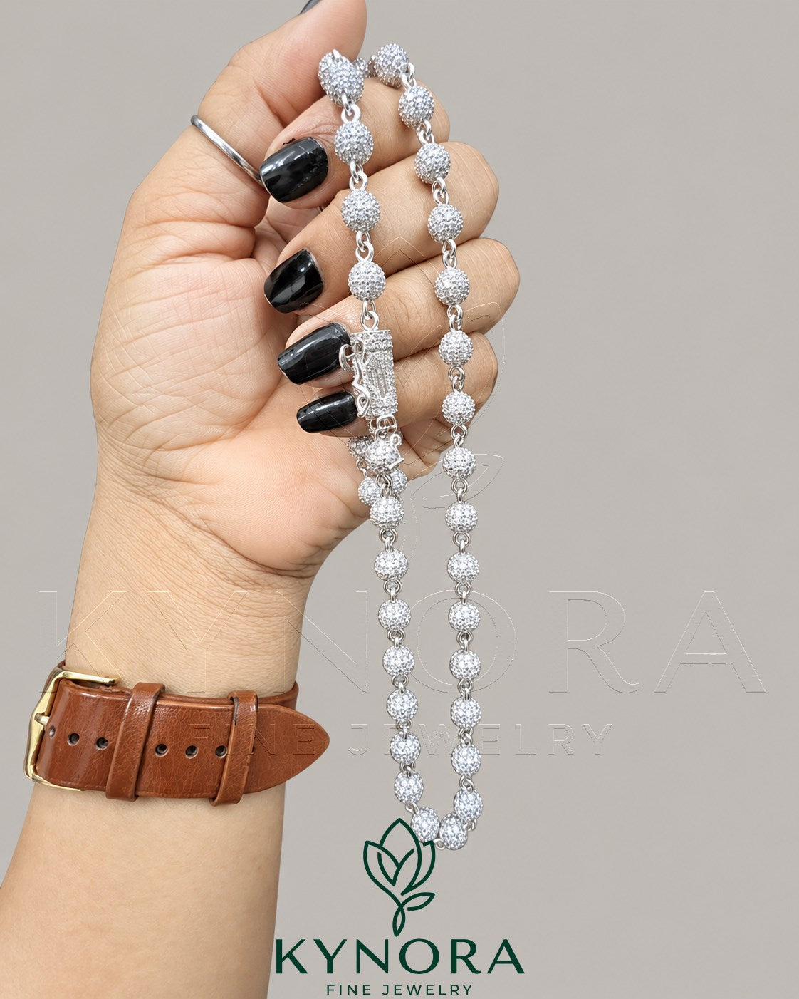 Sterling silver hip-hop chain with 7mm VVS1 Moissanite diamonds and custered ball design, by Kynora Jewels.