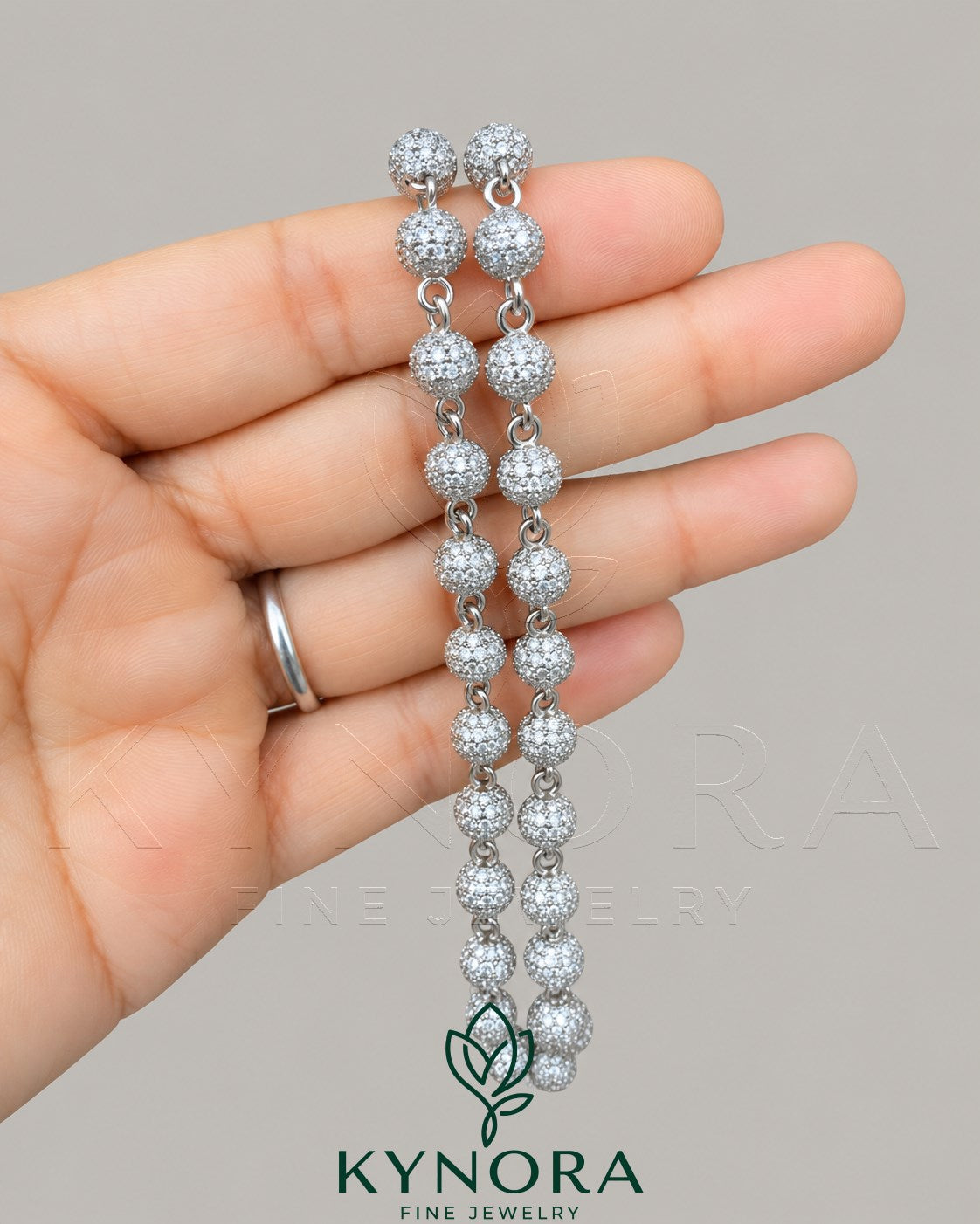 Sterling silver 7mm VVS1 moissanite diamond hip-hop chain with clustered ball design by Kynora Jewels.