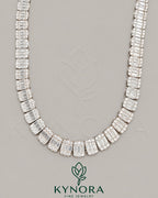8.5mm VVS1 Moissanite diamond sterling silver eternity tennis chain by Kynora Jewels, featuring sparkling gemstone accents.