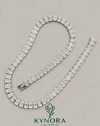 8.5 mm VVS1 moissanite diamond sterling silver tennis necklace, 18-inch Hiphop chain by Kynora Jewels, showcasing sparkling gemstones.