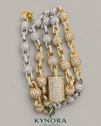 Sterling silver hip-hop chain necklace with fully iced out clustered ball design by Kynora Jewels, showcasing shiny, detailed silver jewelry.