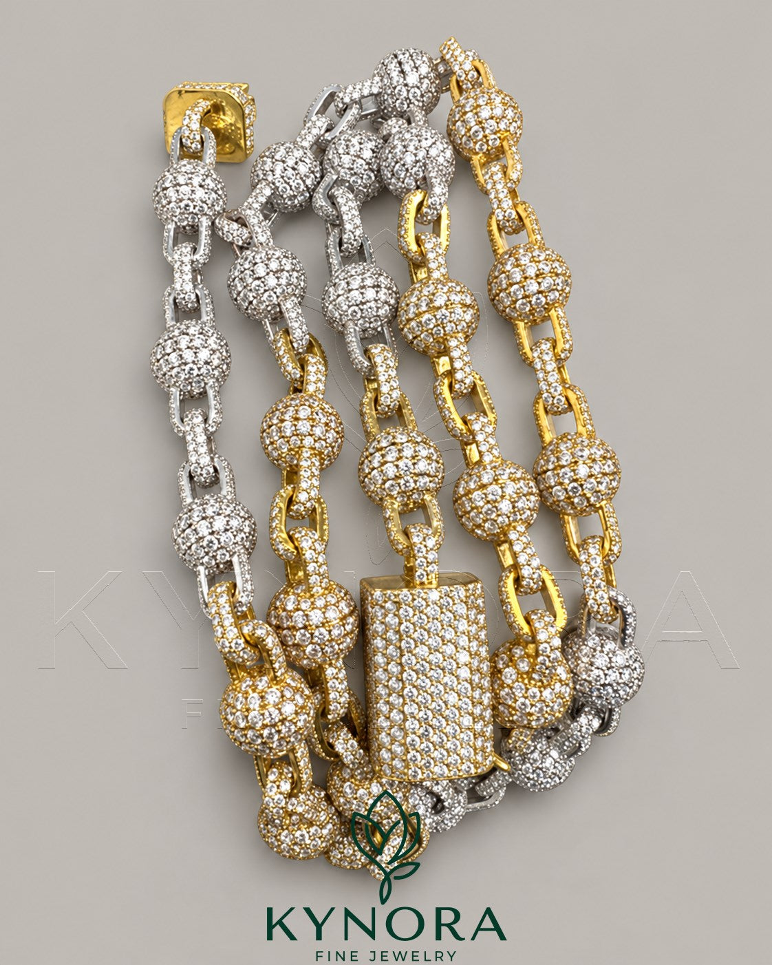 Sterling silver hip-hop chain necklace with fully iced out clustered ball design by Kynora Jewels, showcasing shiny, detailed silver jewelry.