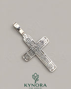 Silver hip-hop pendant featuring iced out baguette moissanite diamonds in a cross design, crafted by Kynora Jewels.