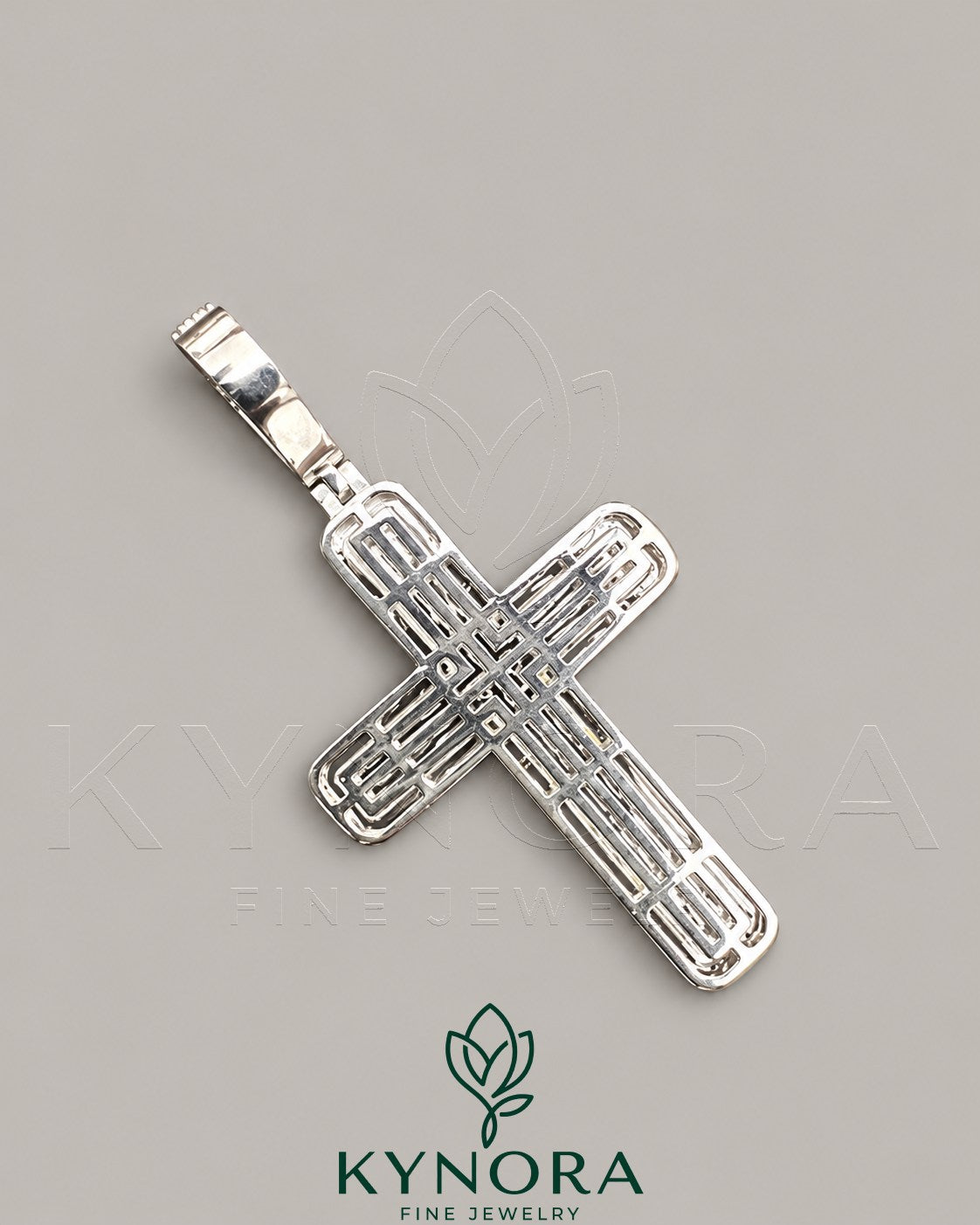 Silver hip-hop pendant featuring iced out baguette moissanite diamonds in a cross design, crafted by Kynora Jewels.