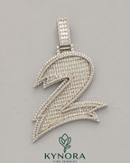 Sterling silver hip-hop pendant featuring icy baguette moissanite diamonds shaped as the number 2, stylish Kynora Jewels design.