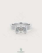 Moissanite radiant cut solitaire engagement ring with wide band in 925 sterling silver by Kynora Jewels.