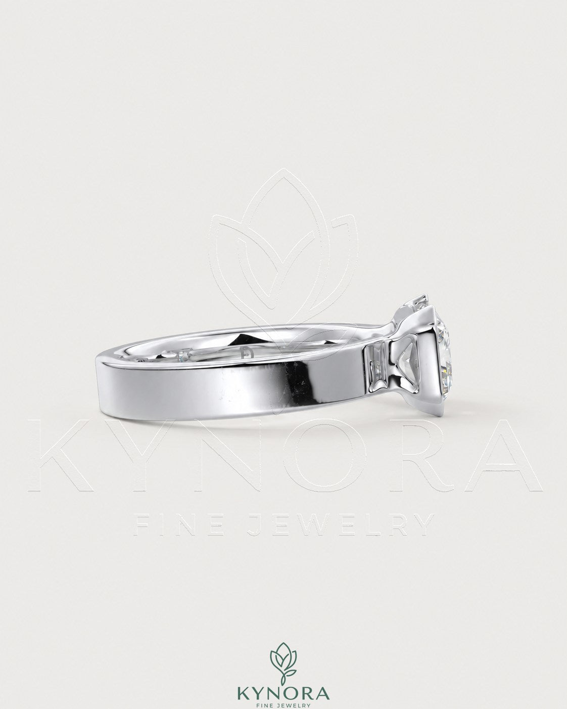 Moissanite radiant cut engagement ring with wide sterling silver band, featuring a solitaire design by Kynora Jewels.