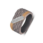Men's titanium ring with diagonal pave moissanite accents and hammered 10k gold finish, stylish Kynora Jewels band.