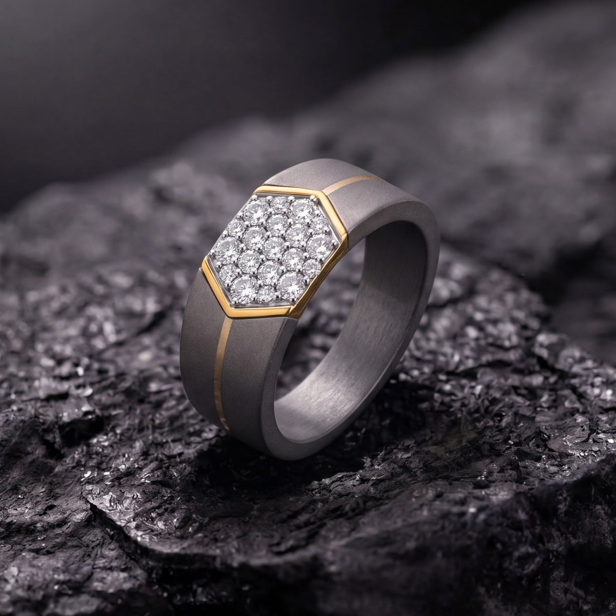 Men's hexagon cluster moissanite ring in titanium and 10k yellow gold featuring a detailed geometric design.