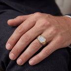 Men's hexagon pave moissanite titanium ring in 10k yellow gold, featuring sparkling stones and modern geometric design.