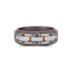 Men's Moissanite station band ring in 10k yellow gold and titanium, featuring sparkling moissanite stones on a sleek titanium band.