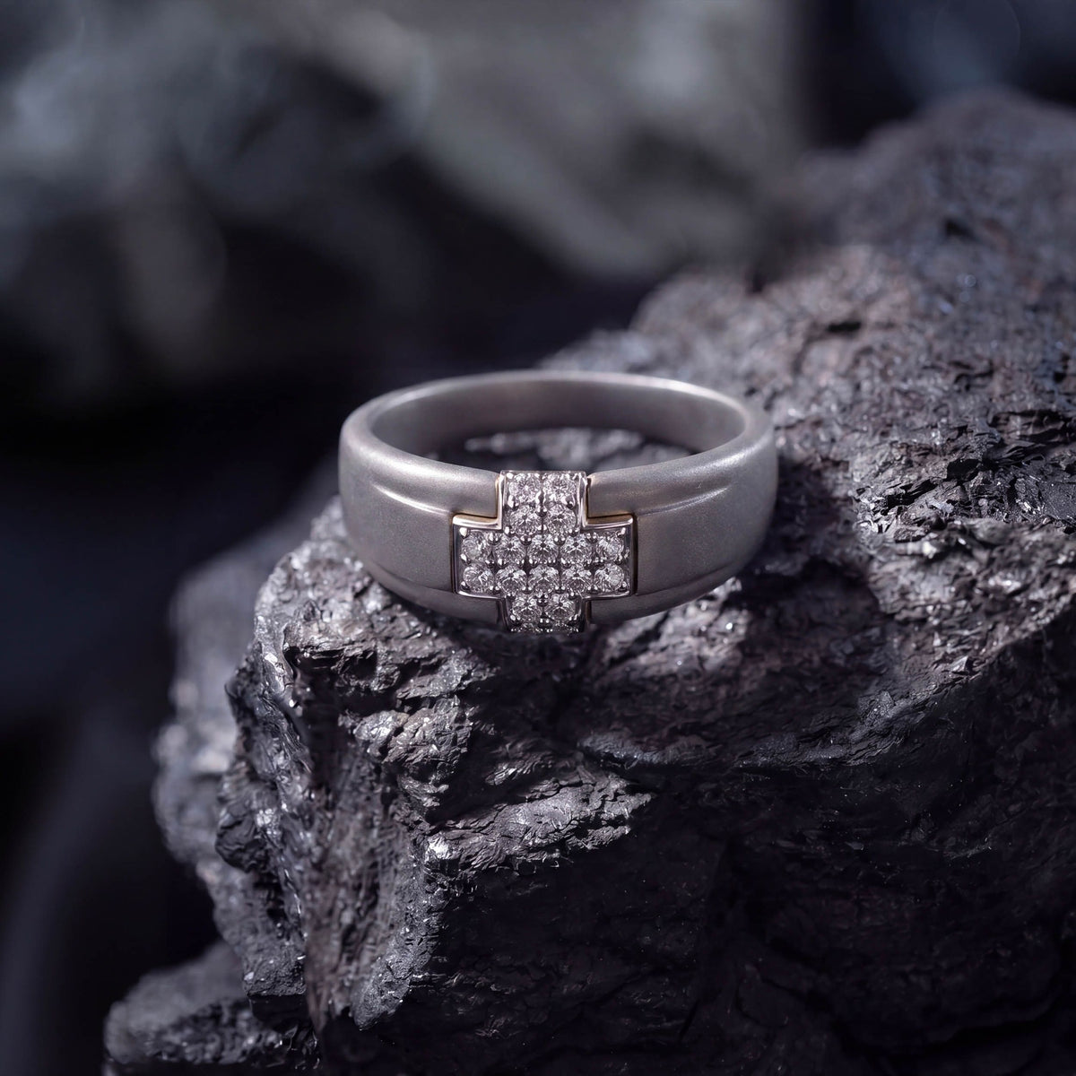 Men's titanium ring with pave moissanite cross design in 10k yellow gold, showcasing intricate detail and polished finish.