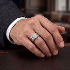 Men's two-tone titanium ring with pave moissanite accents in 10k yellow gold and titanium, stylish and durable jewelry from Kynora Jewels.
