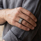 Men's rectangular pave moissanite signet ring in 10k gold and titanium, showcasing a sleek design with sparkling stones.