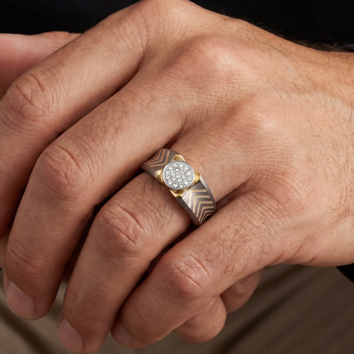 Men's round moissanite cluster wedding band featuring 10k yellow gold and titanium, showcasing a sparkling gemstone design.