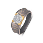 Men's round moissanite cluster wedding band in 10k yellow gold and titanium, featuring sparkling gemstones and a sleek titanium finish.