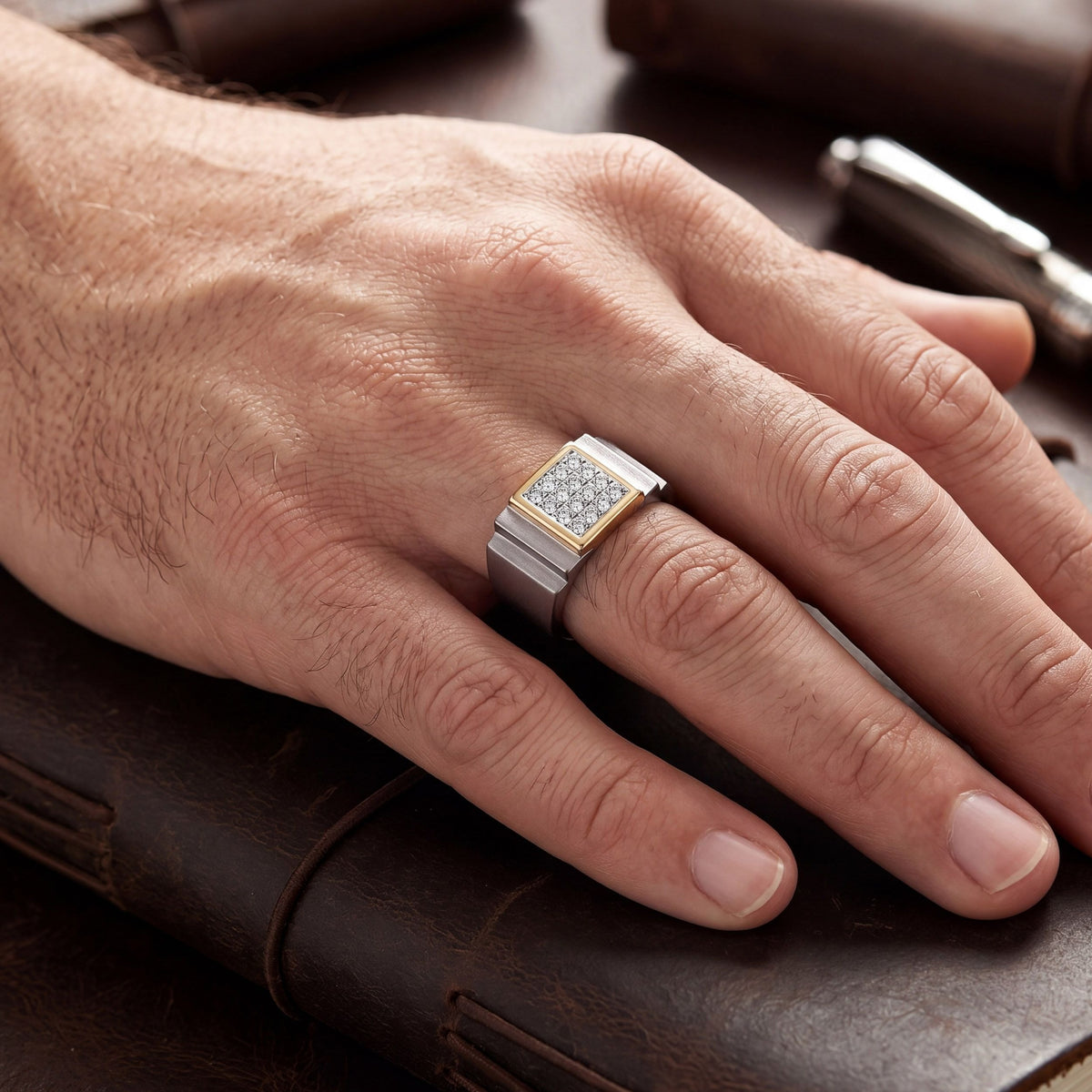 Men's titanium ring with a square moissanite cluster band in 10k yellow gold, featuring a modern, sleek design.