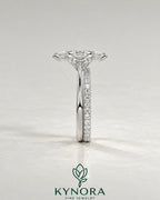 2-karätiger Solitär-Verlobungsring mit birnenförmigem Diamanten in Ost-West-Ausrichtung, Krappenfassung und geschwungener Ringschiene