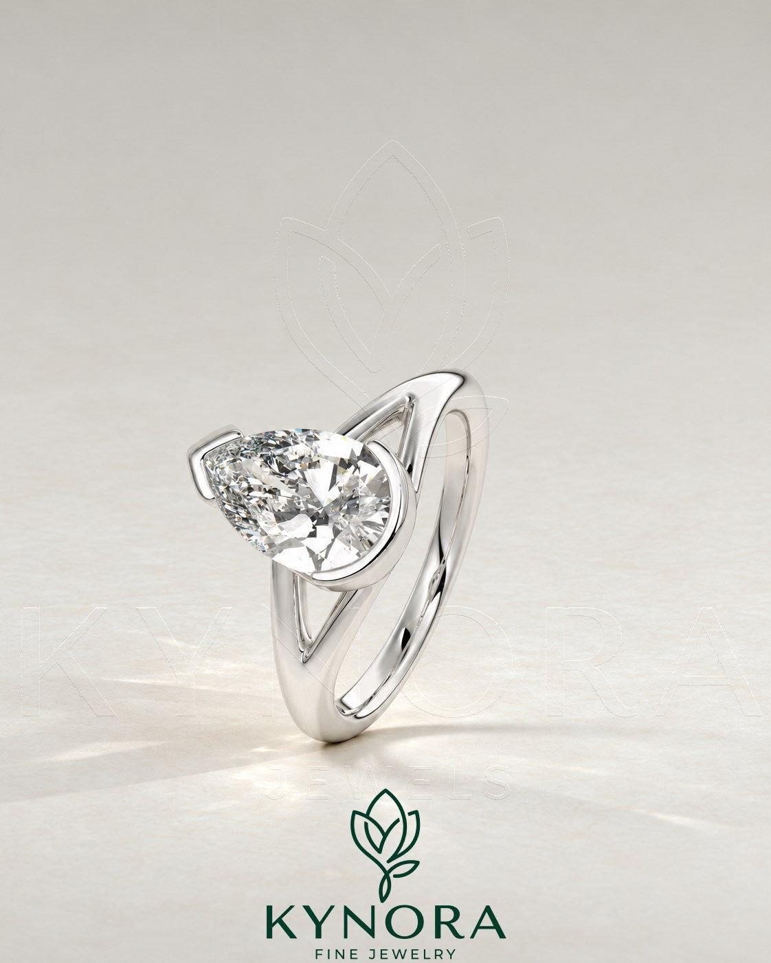 2-karätiger Solitär-Verlobungsring mit birnenförmigem Diamanten in Ost-West-Ausrichtung, Krappenfassung und geschwungener Ringschiene