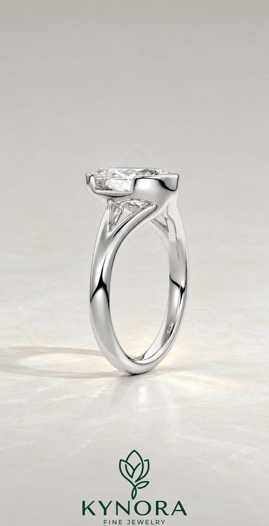 2-karätiger Solitär-Verlobungsring mit birnenförmigem Diamanten in Ost-West-Ausrichtung, Krappenfassung und geschwungener Ringschiene