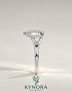 2-karätiger Solitär-Verlobungsring mit birnenförmigem Diamanten in Ost-West-Ausrichtung, Krappenfassung und geschwungener Ringschiene