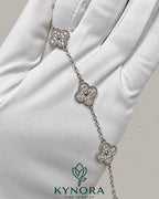 925 Sterling Silver Moissanite Diamond hip-hop bracelet with van clef design by Kynora Jewels, featuring sparkling gemstones and bold style
