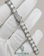 Kynora Jewels 5mm round cut VVS1 moissanite diamond hip hop tennis bracelet, showcasing sparkling gemstone links.