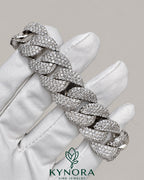 Sterling silver 20mm Moissanite diamond Cuban hip hop bracelet with bold links, featuring sparkling gemstone accents from Kynora Jewels.