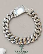 Sterling silver Miami Cuban box lock bracelet with VVS1 moissanite diamonds, custom hip-hop jewelry by Kynora Jewels.
