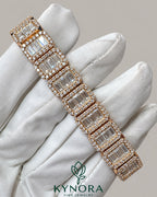 Sterling silver hip hop tennis bracelet with 13mm VVS moissanite stones, featuring a bold, stylish design by Kynora Jewels.