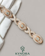 Unisex 12mm iced out infinity evil eye sterling silver bracelet by Kynora Jewels, featuring sparkling cubic zirconia accents.