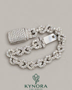 Kynora Jewels 10mm VVS1 Moissanite diamond infinity bracelet featuring a hip-hop style design with sparkling stones and silver setting.