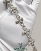 Kynora Jewels fully iced out cross moissanite hip hop diamond bracelet with sparkling stones and bold design.