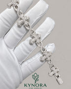 Kynora Jewels fully iced out cross moissanite hip hop diamond bracelet with sparkling stones and intricate metalwork.