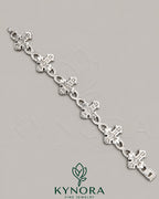 Kynora Jewels fully iced out cross moissanite hip hop diamond bracelet with sparkling stones and bold design.