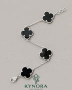 Black Arpels 925 Sterling Silver Van Cleef hip-hop bracelet by Kynora Jewels, showcasing bold silver design and intricate details.