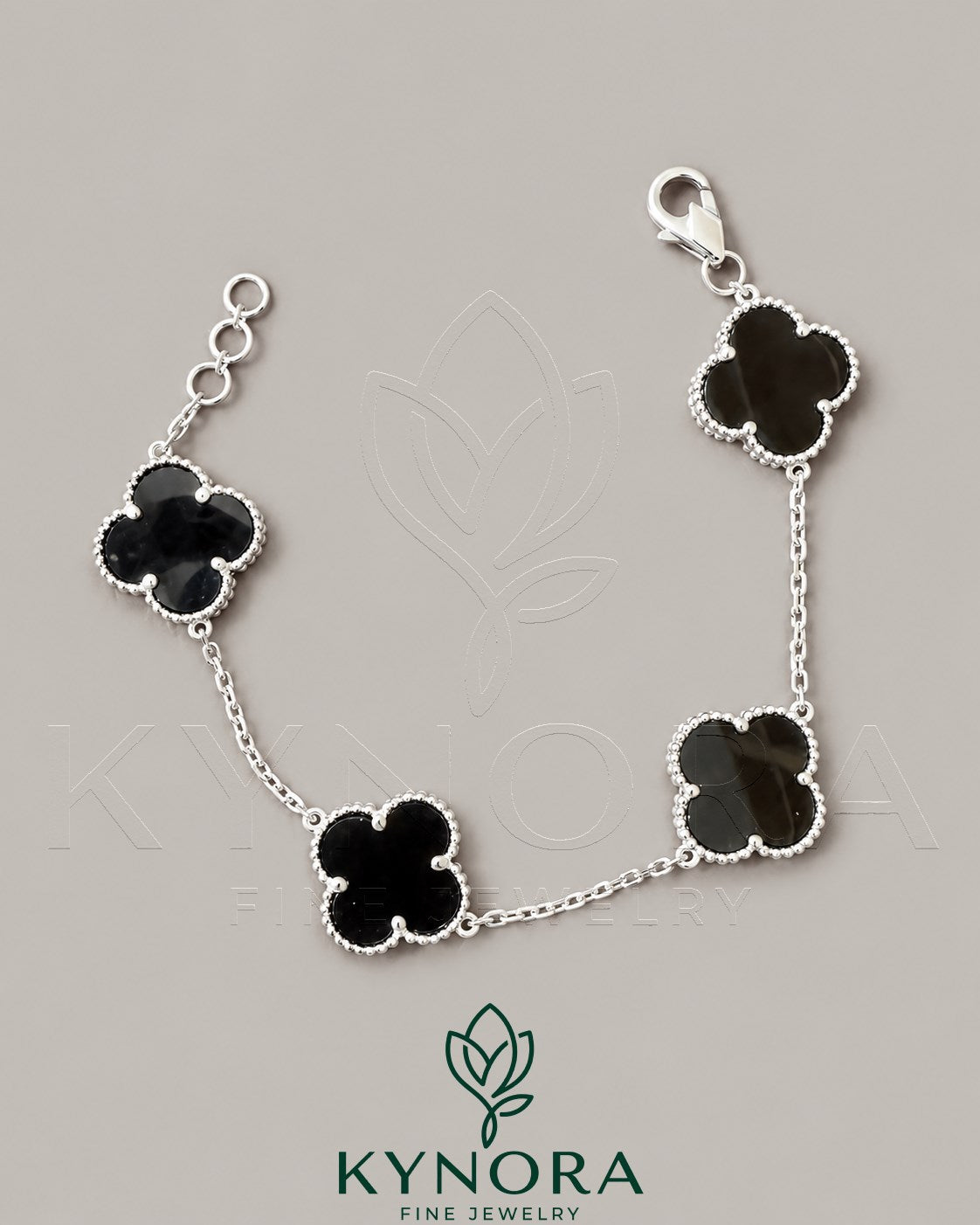 Sterling silver Van Cleef-style hip-hop bracelet by Kynora Jewels featuring black finish and bold design.