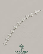 VVS1 Moissanite diamond Kynora Jewels silver hip-hop bracelet with bold chain design and sparkling gemstones.