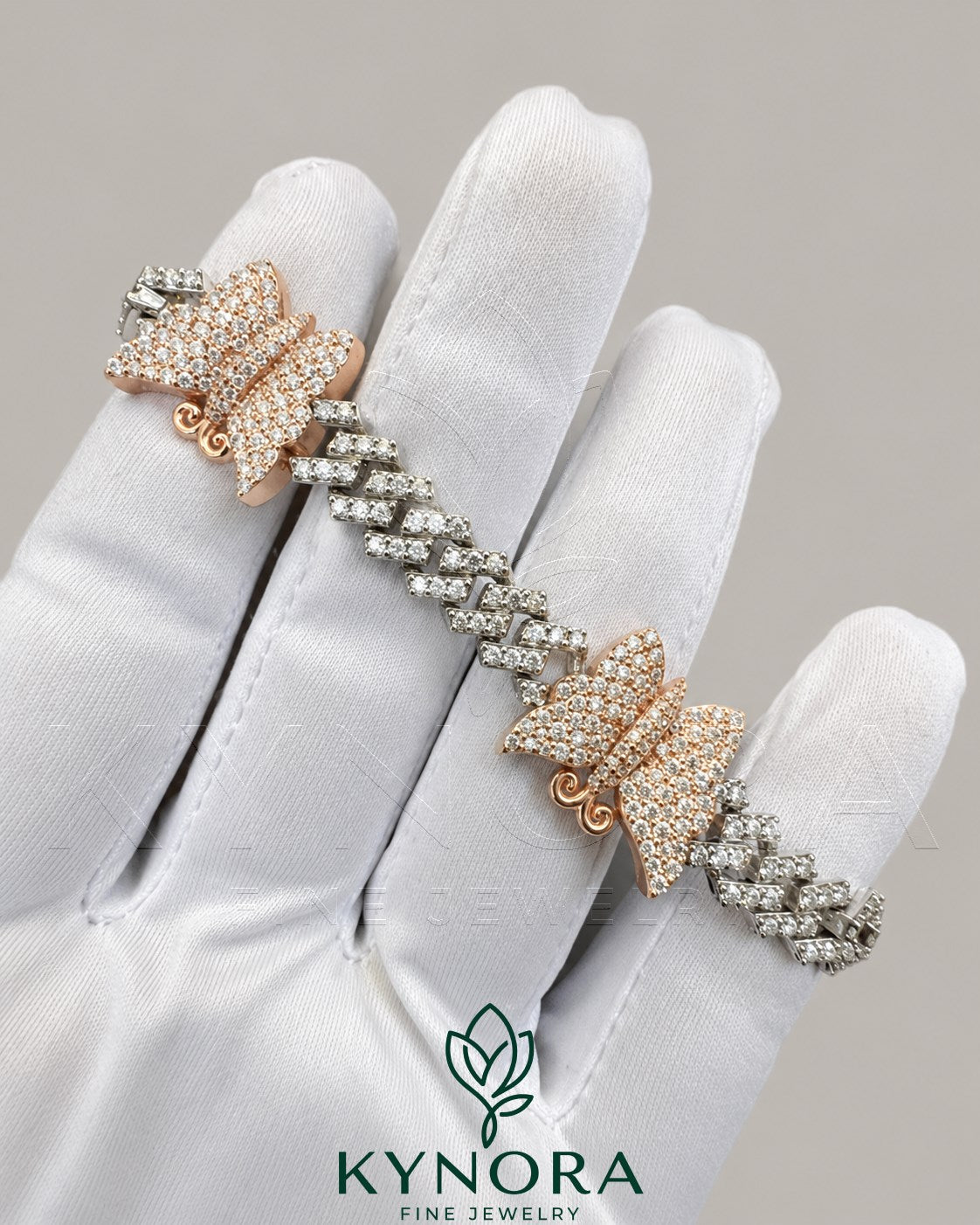 Kynora Jewels VVS1 moissanite butterfly-shaped hip-hop bracelet with sparkling diamond-like stones on a silver chain.