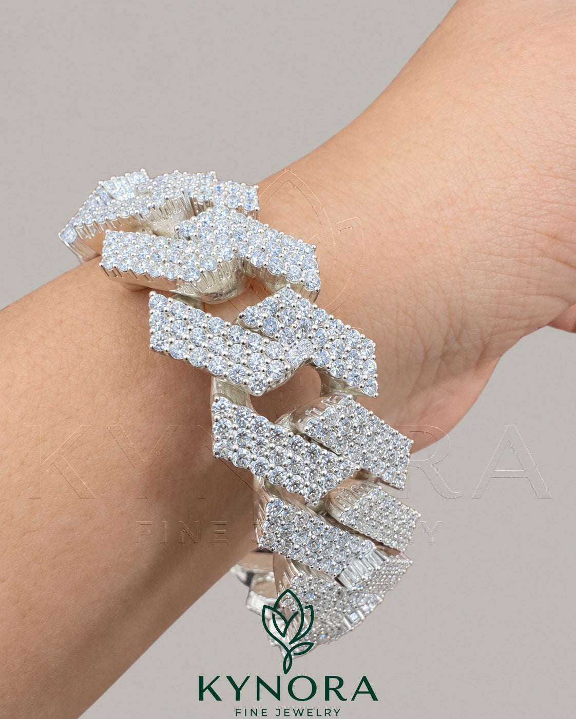 Sterling silver 18mm moissanite rapper hip hop bracelet with sparkling stones, stylish jewelry by Kynora Jewels. Main image
