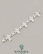 Sterling silver hip hop bracelet with fully iced-out moissanite and diamond accents, gold finish, by Kynora Jewels.
