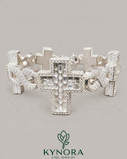 Fully iced out cross moissanite diamond sterling silver gold hip hop bracelet by Kynora Jewels, showcasing intricate design and sparkling stones.