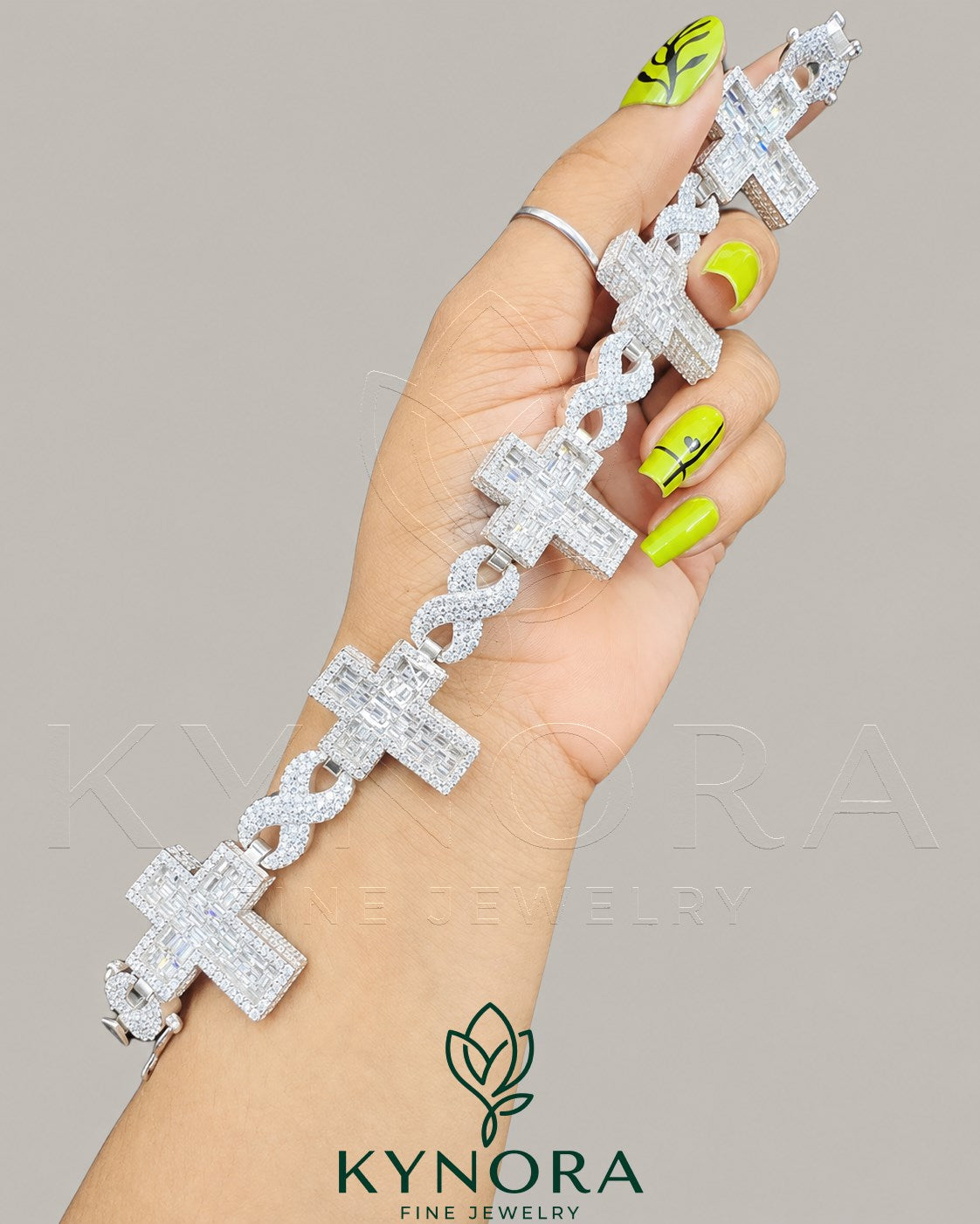 Sterling silver gold hip hop bracelet with fully iced out moissanite diamonds, stylish Kynora Jewels cross design.