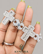 Kynora Jewels iced-out cross moissanite diamond silver gold hip hop bracelet with sterling silver and gold accents.