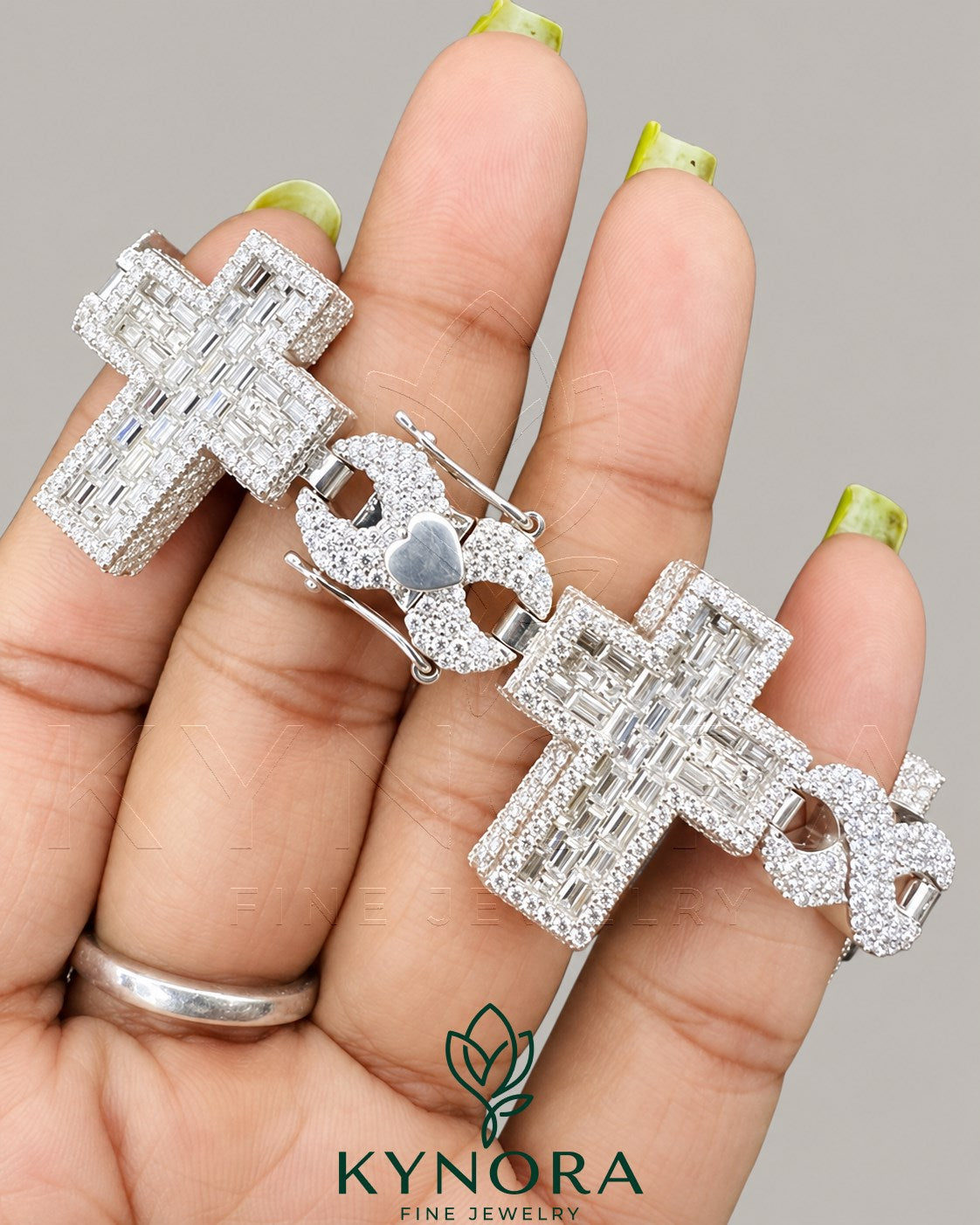 Kynora Jewels iced-out cross moissanite diamond silver gold hip hop bracelet with sterling silver and gold accents.