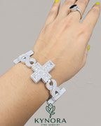 Fully iced out cross moissanite diamond hip hop bracelet in 925 sterling silver with gold accents by Kynora Jewels.