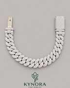 14mm moissanite Cuban link bracelet in sterling silver with iced out design, crafted by Kynora Jewels.