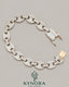 Sterling silver hip-hop bracelet with 12mm moissanite diamonds, featuring a bold design and sparkling gemstone accents.