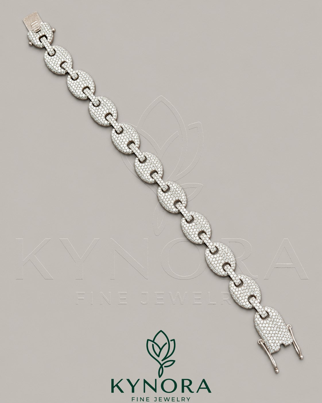 Sterling silver 12mm Moissanite diamond hip-hop bracelet by Kynora Jewels with sparkling gemstones and bold design.