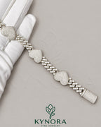 12mm men's VVS moissanite heart Cuban bracelet by Kynora Jewels, featuring a stylish hip-hop design with sparkling stones.